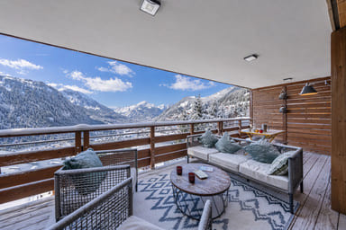 Residence The Flambeaux, Châtel, Balcony with garden furniture and mountain view