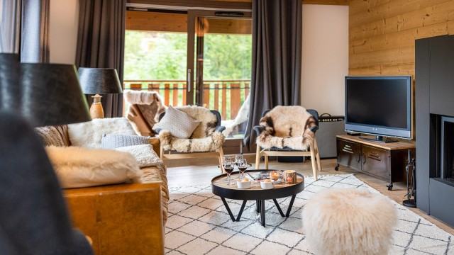 Appartement 10 personnes à Châtel résidence 4 élèments salon avec cheminée