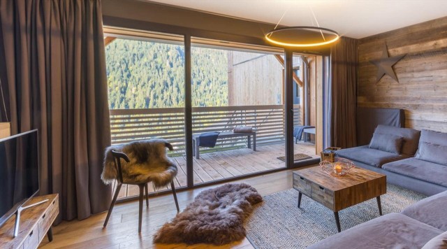 Appartement 6 personnes à Châtel résidence 360 centre du village salon avec balcon