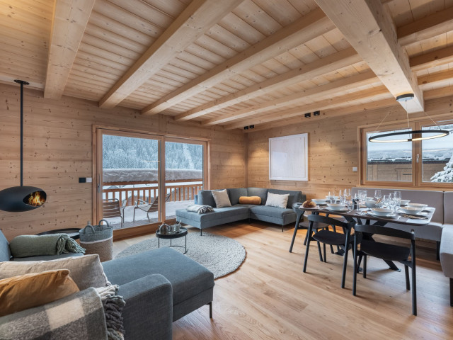 Apartment in chalet 3 fontaines,  Living room with fireplace, Châtel Ski holiday