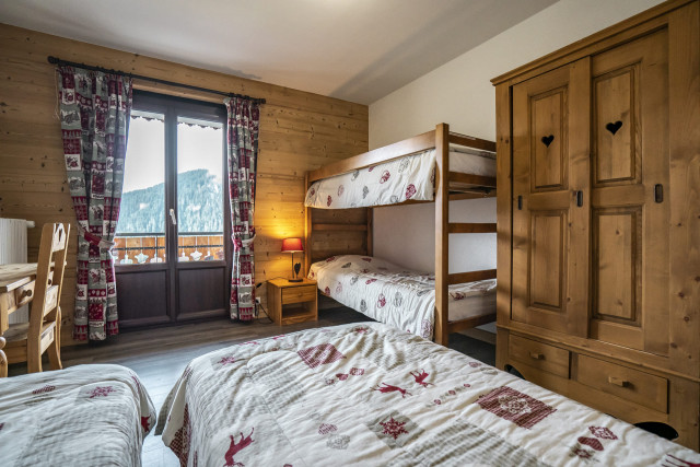 Appartement dans chalet Pensée des Alpes, Chambre 2 lits simples et 2 lits superposés, Châtel Réservation