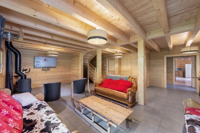 Chalet Bruno 16 personnes Chalet Linga salon poêle à bois