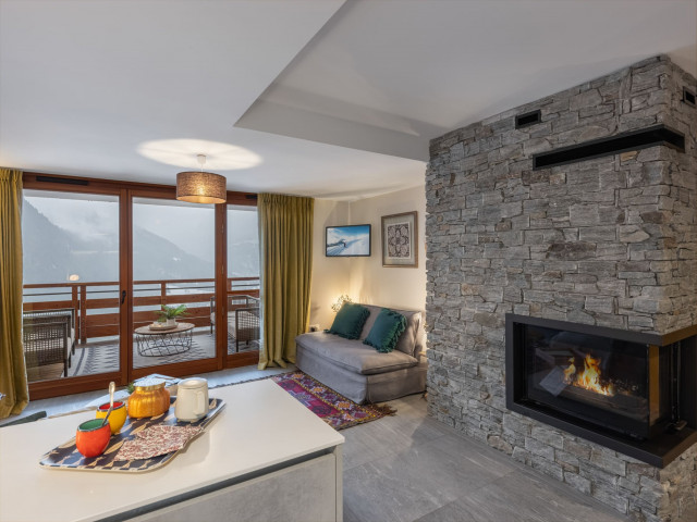 Residence the Flambeaux, Living room with fireplace, Châtel Mountain 74