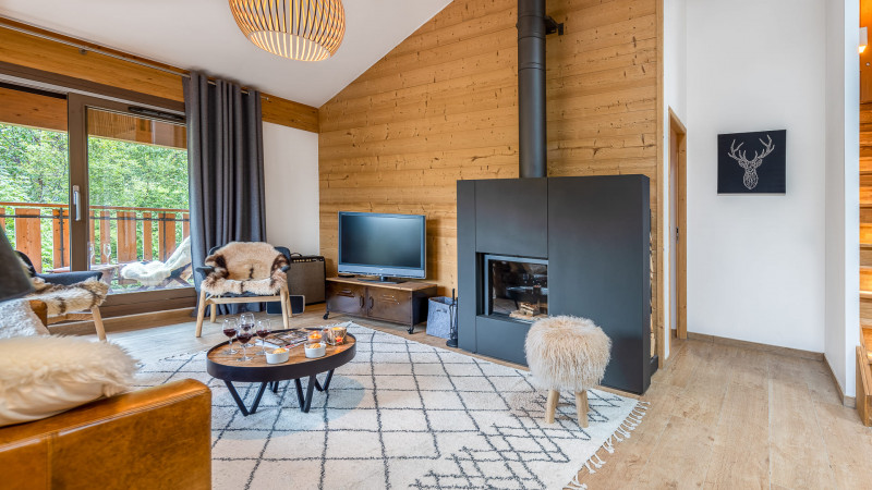 Apartment in Châtel residence 4 Elements, Living room with fireplace, Haute-Savoie