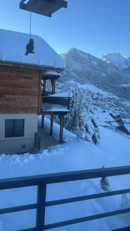 View from a sunny terrace, Châtel, Haute-Savoie, family vacations: skiing, snow, mountains View from a sunny terrace, Châtel, Haute-Savoie, family vacations: skiing, snow, mountains